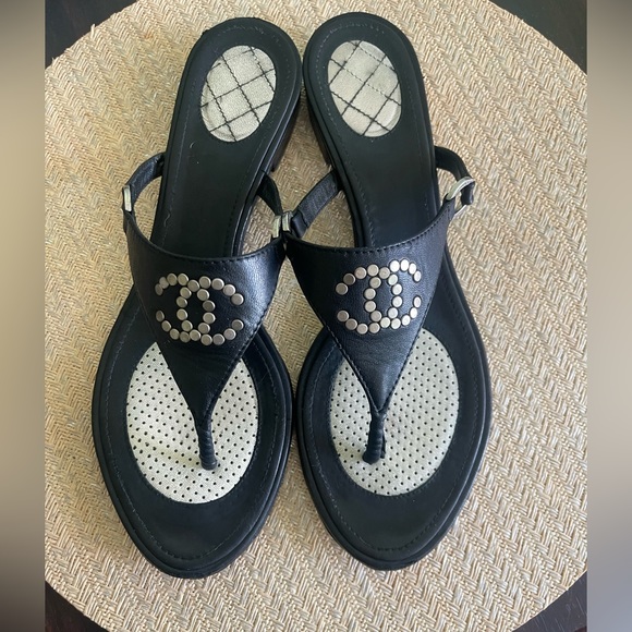 CHANEL Shoes - Authentic Chanel thong leather sandals .